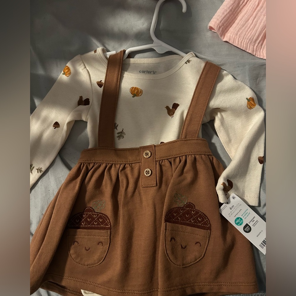 Baby dress brand new with tags never worn 0-3 months